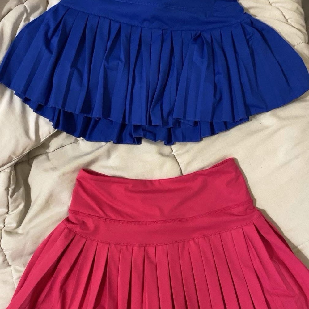 Gold Hinge Pink Pleated Skirt 
One pink Available 
Blue SOLD
Sold separately